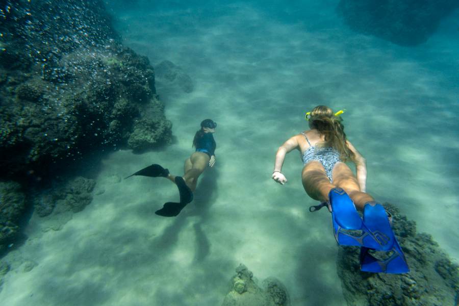 Two girls enjoying diving