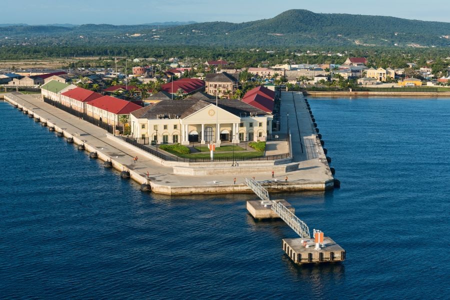 A peaceful view of Falmouth’s cruise port with its historic waterfront building.