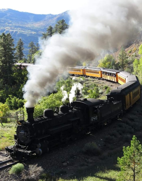 black train engine with steam stack in Colorado