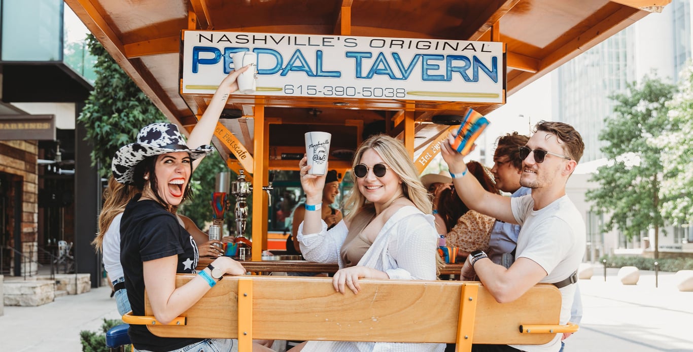 Group celebrating on the Pedal Tavern