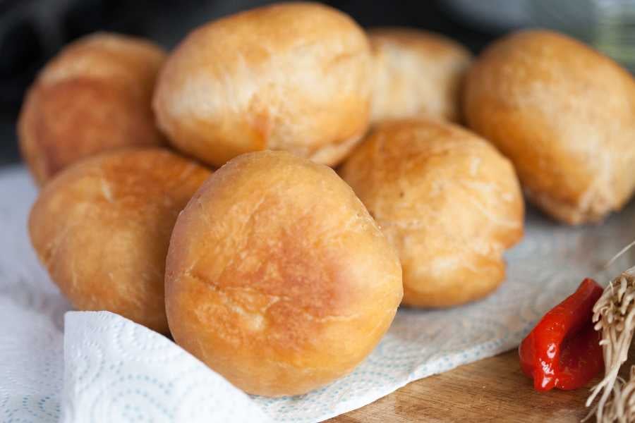 Soft, golden fried buns, perfect for a snack or a meal.