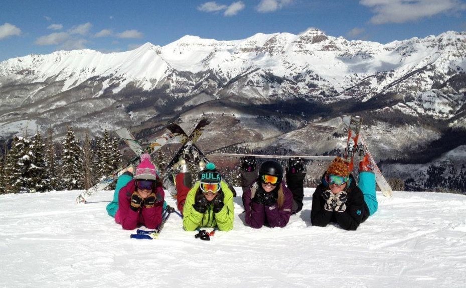 a group of locals celebrating International Womens Ski Day