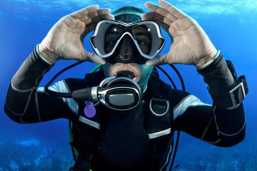 A diver is enjoying diving in the water