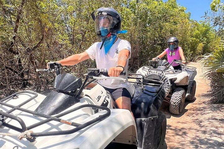 Group enjoying the ATV and beach club combo tour in Costa Maya