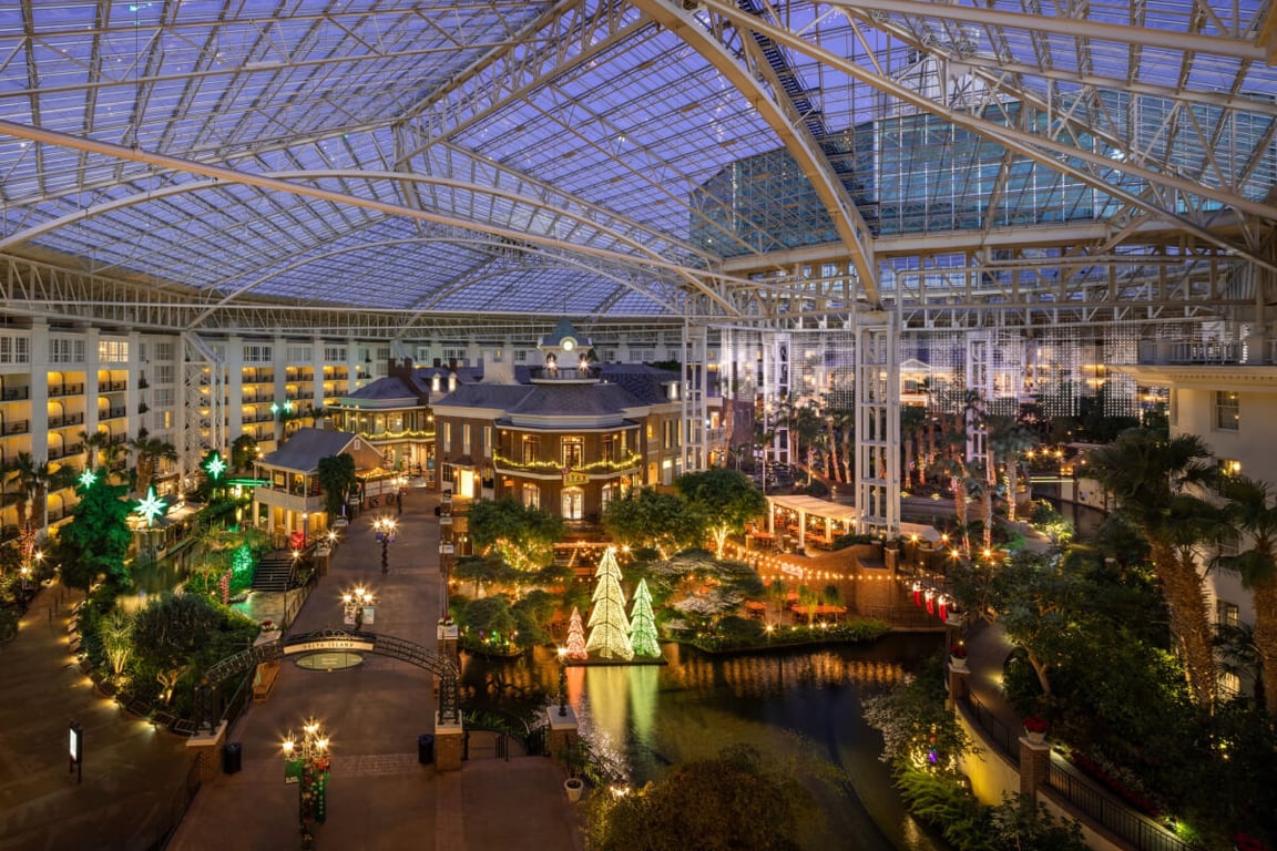 Holiday lights and festive decorations inside Gaylord Opryland Hotel atrium