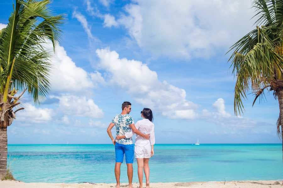 A couple is enjoying their time at the beach