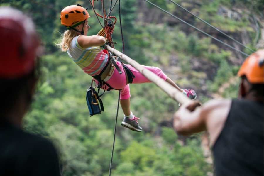 A girl enjoying a zipline adventure