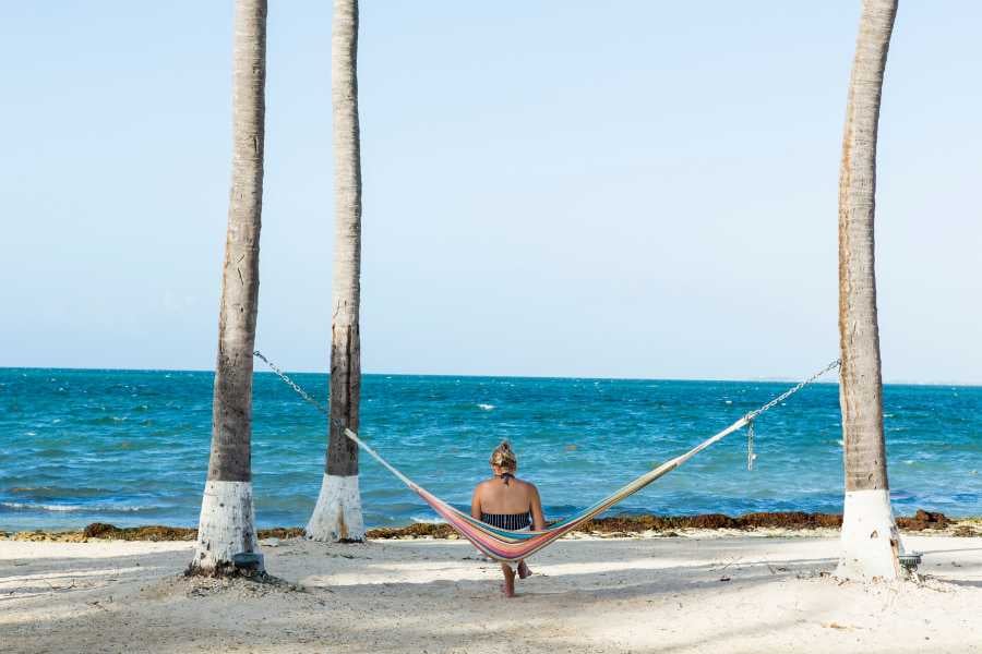 A woman is relaxing on the beach