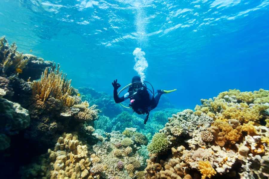 A man is enjoying deep water diving