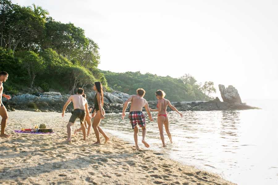 Some friends are having fun on the beach